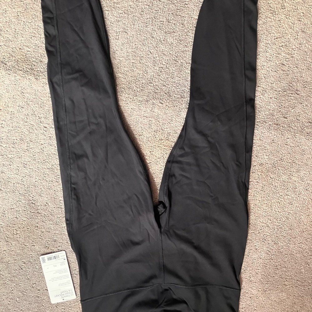 Athleta Black Ultimate Stash Pocket Tights